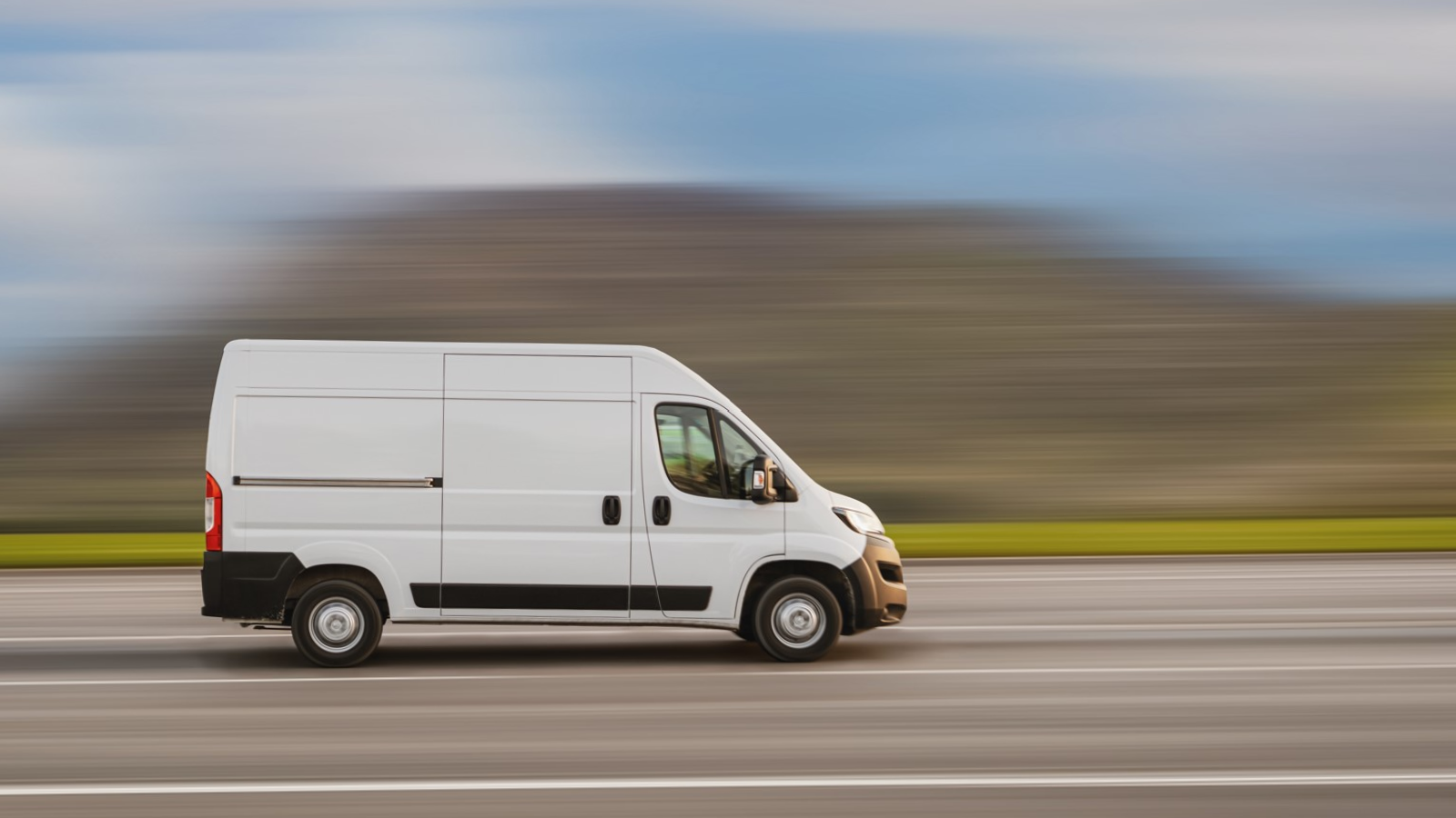 Long distance non-emergency medical transportation van traveling from Jacksonville FL